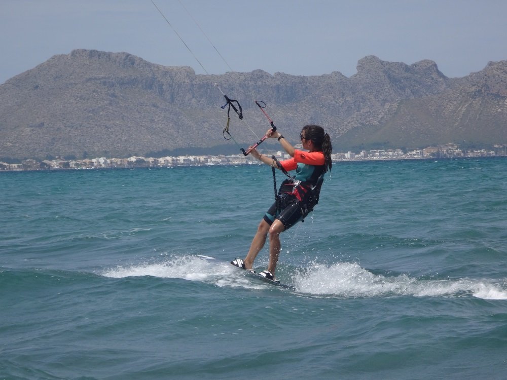 9-Marta-gaining-speed-kitesurfing-lessons-mallorca-kitesurfing mallorca-com